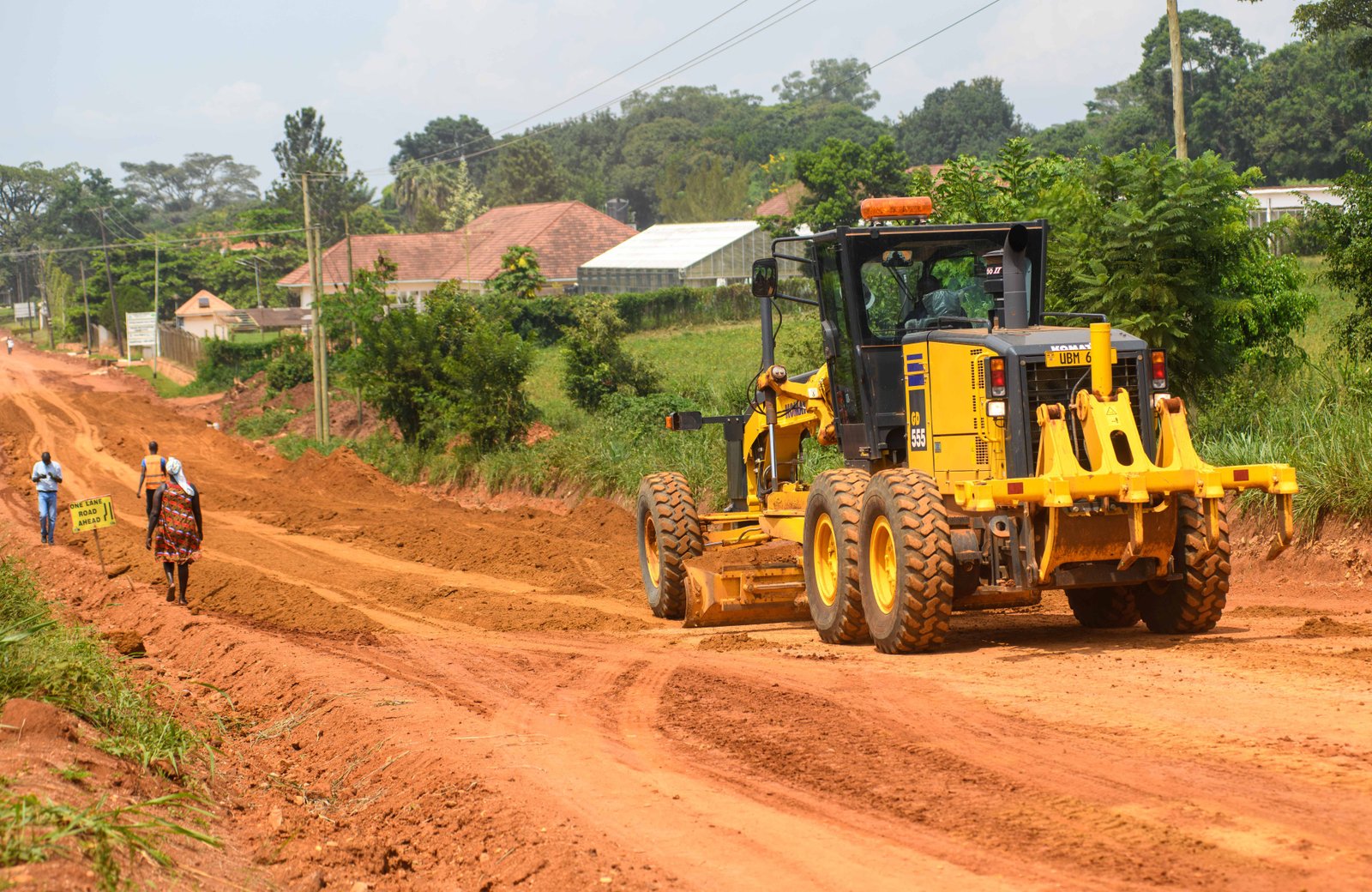 Road construction — heavy machinery on a dirt road